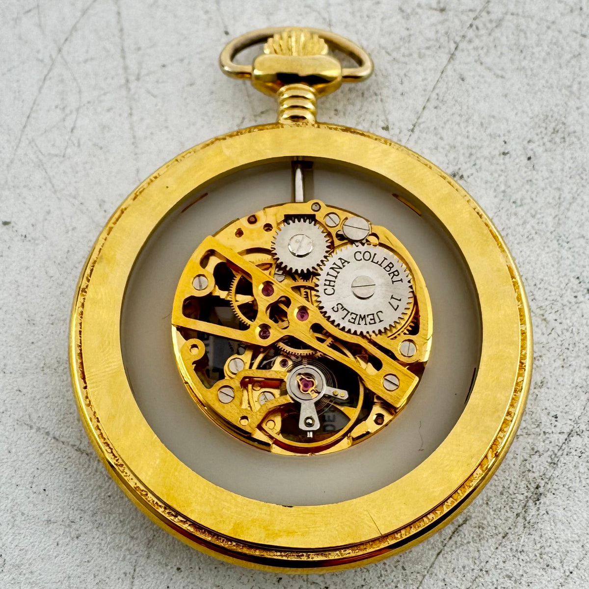 Colibri Skeletonized Roman Dial